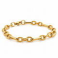 Gold-toned stainless steel chain bracelet featuring twisted rope-style links connected by elongated polished bar links.
Statement link bracelet with a shiny golden finish and lobster clasp, displayed on a clean off-white background.