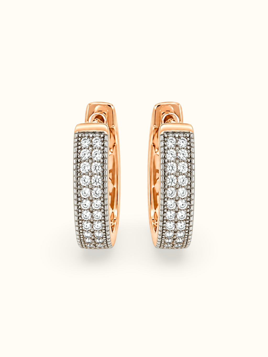 Rose gold-tone hoop earrings with clear sparkling stones and a dark textured base displayed against a white background.