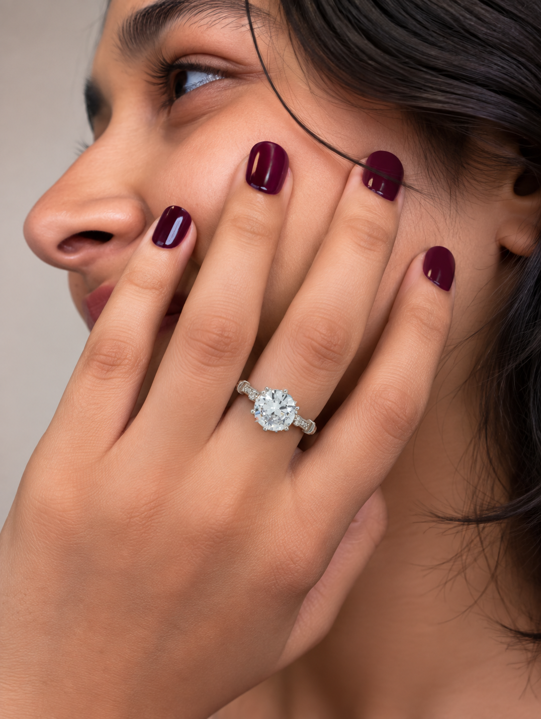 Model wearing a proposal solitaire ring