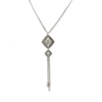 Silver necklace with a diamond-shaped pendant on a white background