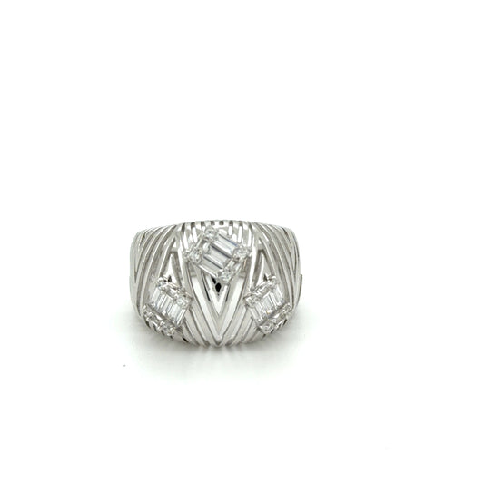 Silver ring with diamond accents on a white background