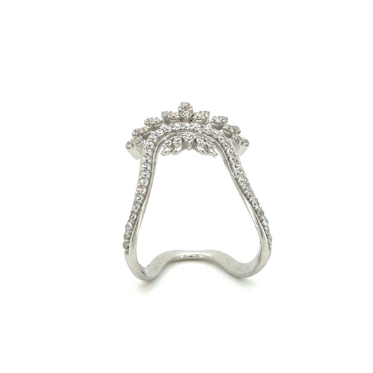 Silver ring with diamond accents on a white background