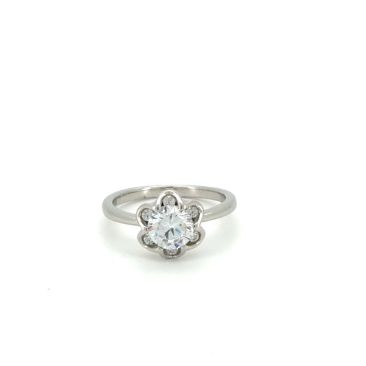 Silver ring with a diamond on a white background