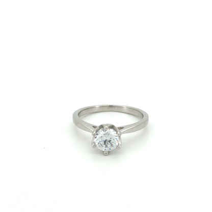 Silver ring with a diamond on a white background