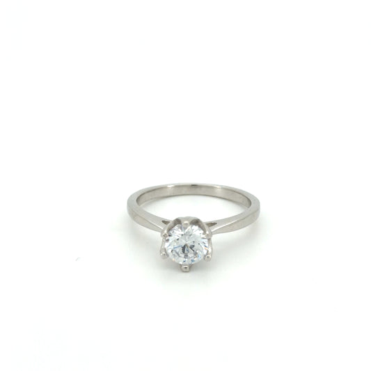 Silver ring with a diamond on a white background